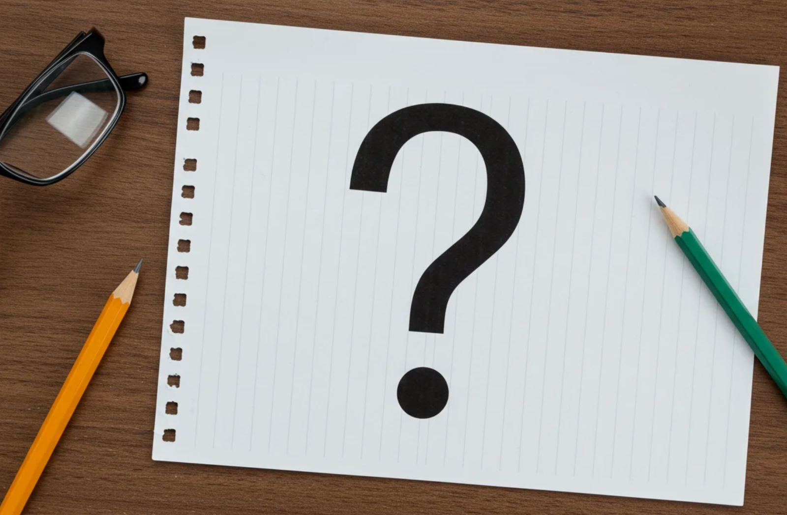 pad of paper with question mark